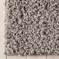 Elle Basics Emerson Solid Shag Beige/Grey 9 ft. 3 in. x 12 ft. 6 in. Area Rug by Well Woven -Linon Home Decor Sales beige grey well woven area rugs ell 18 8 1f 1000