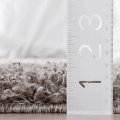 Elle Basics Emerson Solid Shag Beige/Grey 9 ft. 3 in. x 12 ft. 6 in. Area Rug by Well Woven -Linon Home Decor Sales beige grey well woven area rugs ell 18 8 fa 1000