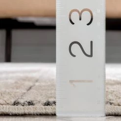 Malaga Fresco Tribal Geometric Beige 5 ft. 3 in. x 7 ft. 3 in. Distressed High-Low Area Rug by Well Woven -Linon Home Decor Sales beige well woven area rugs mg 202 5 fa 1000