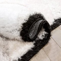 Logan Lowry Abstract Waves Shag Black Ivory 7 ft. 5 in. x 9 ft. 10 in. 3D Textured Area Rug by Well Woven 15 Logan Lowry Abstract Waves Shag Black Ivory 7 ft. 5 in. x 9 ft. 10 in. 3D Textured Area Rug by Well Woven -Linon Home Decor Sales black ivory well woven area rugs log 83 7 44 1000