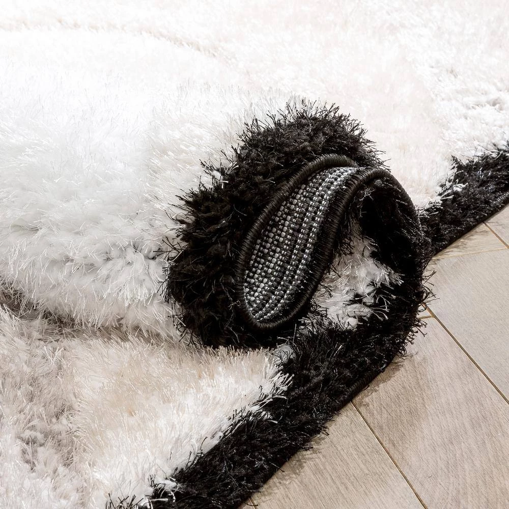 Logan Lowry Abstract Waves Shag Black Ivory 7 ft. 5 in. x 9 ft. 10 in. 3D Textured Area Rug by Well Woven 8 Logan Lowry Abstract Waves Shag Black Ivory 7 ft. 5 in. x 9 ft. 10 in. 3D Textured Area Rug by Well Woven - Image 6