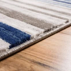 Amba Signature Stripes Blue 5 ft. x 7 ft. Modern Distressed Area Rug by Well Woven -Linon Home Decor Sales blue well woven area rugs am 74 5 40 1000