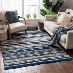 Amba Signature Stripes Blue 5 ft. x 7 ft. Modern Distressed Area Rug by Well Woven -Linon Home Decor Sales blue well woven area rugs am 74 5 c3 1000
