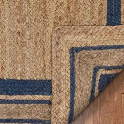 Larkspur Border Pattern Contemporary Blue 5 ft. x 7 ft. 6 in. Hand-Braided Jute Area Rug by Well Woven 16 Larkspur Border Pattern Contemporary Blue 5 ft. x 7 ft. 6 in. Hand-Braided Jute Area Rug by Well Woven -Linon Home Decor Sales blue well woven area rugs lar 24 5 fa 1000
