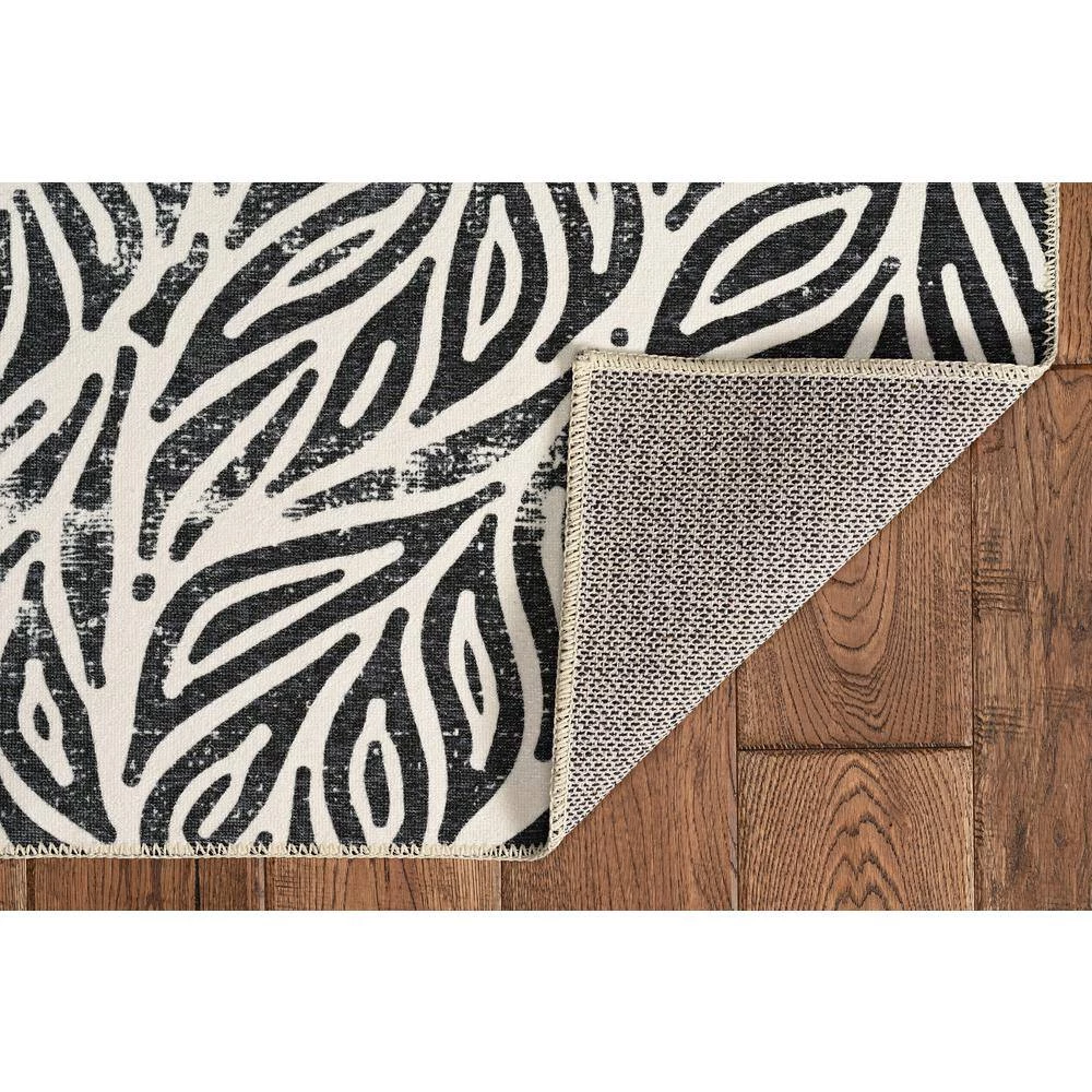 Washable Leif Ivory/Black 3 ft. x 5 ft. Abstract Rectangle Area Rug by Linon Home Decor 4 Washable Leif Ivory/Black 3 ft. x 5 ft. Abstract Rectangle Area Rug by Linon Home Decor - Image 2