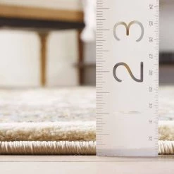 Timeless Aviva Ivory 7 ft. x 9 ft. Traditional Area Rug by Well Woven -Linon Home Decor Sales ivory well woven area rugs 36426 76 1000