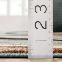 Barclay Nirvana Waves Multi/Blue 5 ft. x 7 ft. Modern Area Rug by Well Woven -Linon Home Decor Sales multi blue well woven area rugs 547055 44 1000