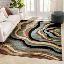 Barclay Nirvana Waves Multi/Blue 5 ft. x 7 ft. Modern Area Rug by Well Woven -Linon Home Decor Sales multi blue well woven area rugs 547055 c3 1000