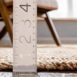 Lani Boucle Natural 5 ft. x 7 ft. 6 in. Hand-Woven Jute Farmhouse Solid Pattern Area Rug by Well Woven -Linon Home Decor Sales natural well woven area rugs lan 18 5 44 1000