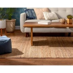 Romy Laylani Farmhouse Solid Pattern Natural 5 ft. x 7 ft. 6 in. Hand-Braided Chunky-Textured Jute Area Rug by Well Woven -Linon Home Decor Sales natural well woven area rugs rom 32 5 fa 1000