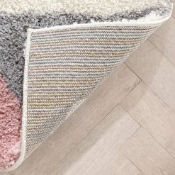 Arden Reily Mid-Century Pink 7 ft. 10 in. x 9 ft. 10 in. Modern Geometric Triangle Pattern Shag Area Rug by Well Woven 16 Arden Reily Mid-Century Pink 7 ft. 10 in. x 9 ft. 10 in. Modern Geometric Triangle Pattern Shag Area Rug by Well Woven -Linon Home Decor Sales pink well woven area rugs ard 19 7 fa 1000